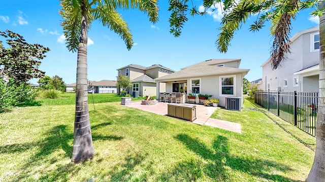 6118 Voyagers Pl, Apollo Beach, FL 33572 - back of house featuring a patio area and stucco siding