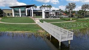 6118 Voyagers Pl, Apollo Beach, FL 33572 - dock featuring a water view and a yard