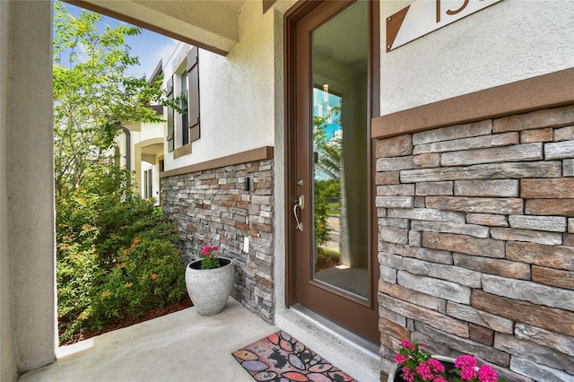 13311 Dorado Shores Ave, Riverview, FL 33579 - property entrance featuring stone siding and stucco siding