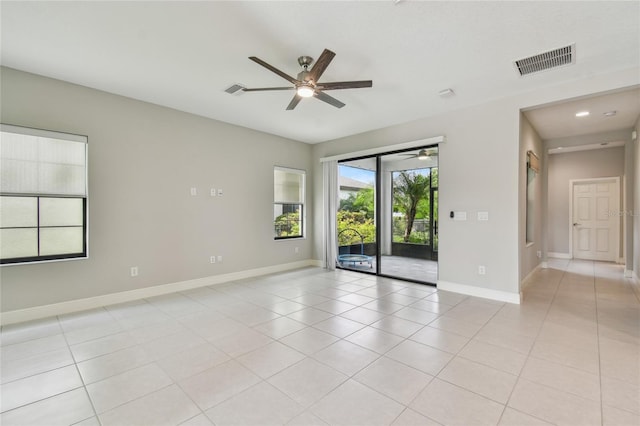 13311 Dorado Shores Ave, Riverview, FL 33579 - unfurnished room with a ceiling fan, baseboards, and light tile patterned floors