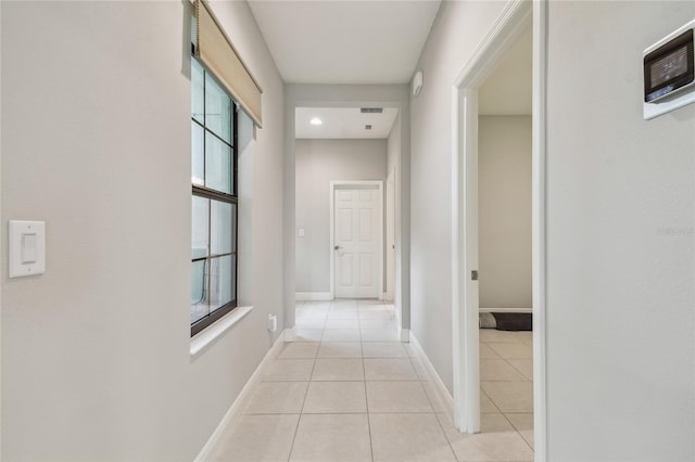 13311 Dorado Shores Ave, Riverview, FL 33579 - hall with light tile patterned floors and baseboards
