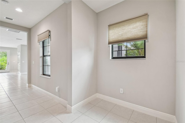 13311 Dorado Shores Ave, Riverview, FL 33579 - unfurnished room with light tile patterned flooring, baseboards, recessed lighting, and a smoke detector