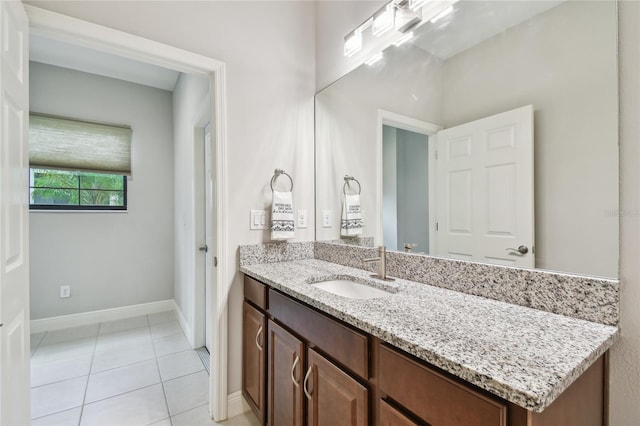 13311 Dorado Shores Ave, Riverview, FL 33579 - bathroom featuring vanity, tile patterned floors, and baseboards