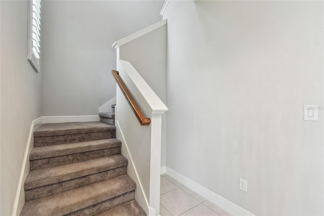 13311 Dorado Shores Ave, Riverview, FL 33579 - staircase with baseboards, tile patterned flooring, and carpet floors