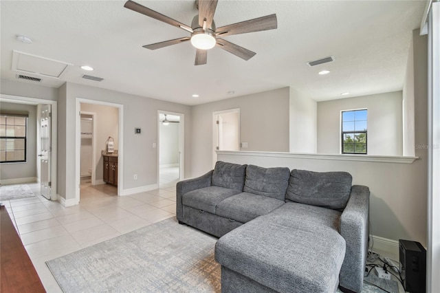 13311 Dorado Shores Ave, Riverview, FL 33579 - living room with ceiling fan, baseboards, light tile patterned floors, and recessed lighting