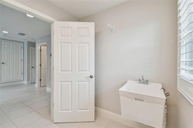 13311 Dorado Shores Ave, Riverview, FL 33579 - bathroom featuring tile patterned floors and baseboards
