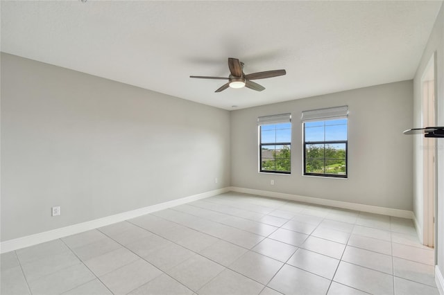 13311 Dorado Shores Ave, Riverview, FL 33579 - unfurnished room featuring a ceiling fan, baseboards, and light tile patterned flooring