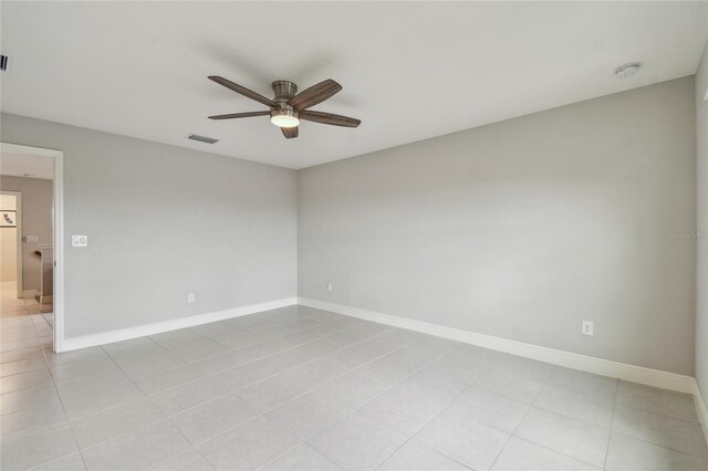 13311 Dorado Shores Ave, Riverview, FL 33579 - empty room with ceiling fan, a smoke detector, light tile patterned floors, and baseboards