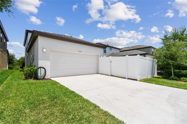 13311 Dorado Shores Ave, Riverview, FL 33579 - garage with driveway