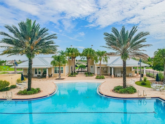 13311 Dorado Shores Ave, Riverview, FL 33579 - community pool featuring a patio area