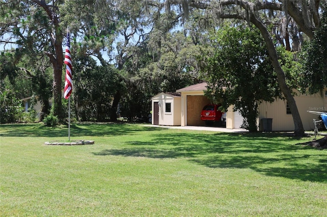 12929 Sugar Creek Blvd, Hudson, FL 34669 - view of green lawn with an outbuilding