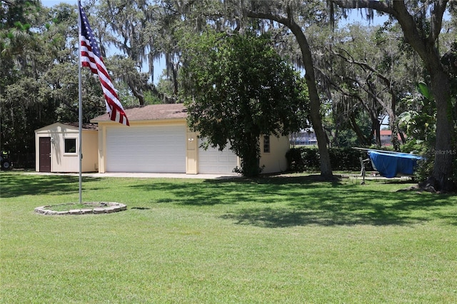 12929 Sugar Creek Blvd, Hudson, FL 34669 - view of front facade with a front lawn, stucco siding, and a garage