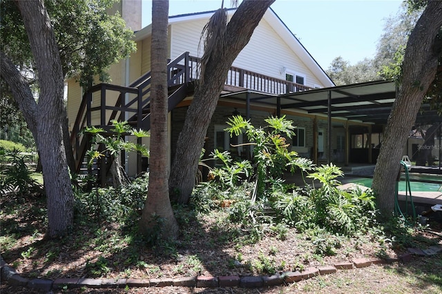 12929 Sugar Creek Blvd, Hudson, FL 34669 - back of property featuring an outdoor pool