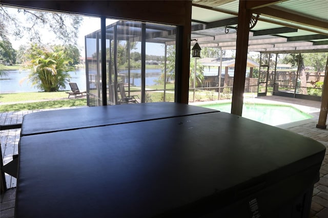 12929 Sugar Creek Blvd, Hudson, FL 34669 - rec room with a water view and healthy amount of natural light