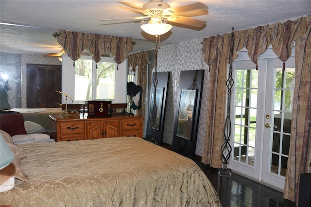 12929 Sugar Creek Blvd, Hudson, FL 34669 - bedroom with wallpapered walls, access to outside, ceiling fan, a textured ceiling, and granite floors
