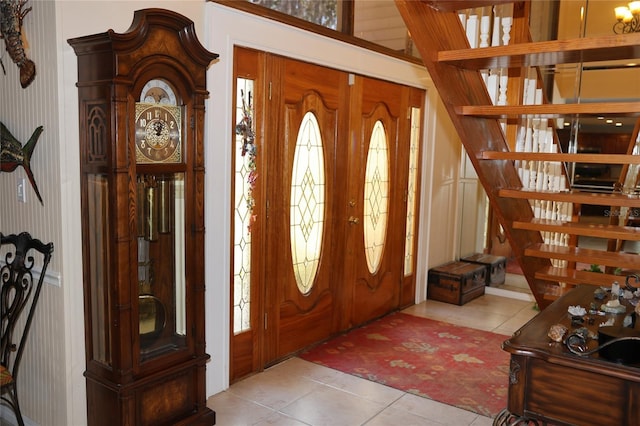 12929 Sugar Creek Blvd, Hudson, FL 34669 - foyer with tile patterned flooring and stairway