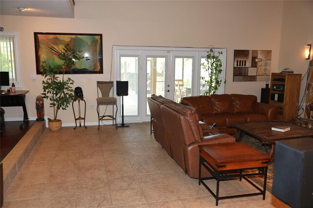 12929 Sugar Creek Blvd, Hudson, FL 34669 - living area with plenty of natural light, french doors, and baseboards