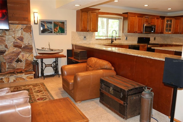 12929 Sugar Creek Blvd, Hudson, FL 34669 - kitchen featuring appliances with stainless steel finishes, light stone counters, decorative backsplash, a sink, and glass insert cabinets