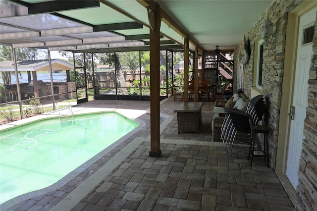 12929 Sugar Creek Blvd, Hudson, FL 34669 - outdoor pool featuring a patio, glass enclosure, an outdoor living space, and stairs