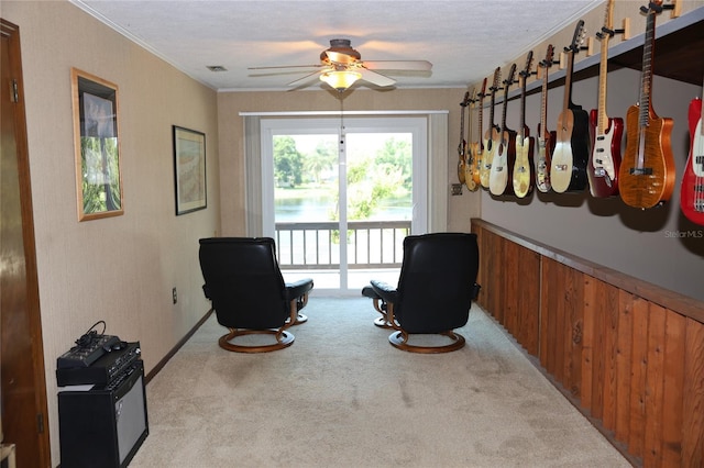 12929 Sugar Creek Blvd, Hudson, FL 34669 - living area featuring light colored carpet, a ceiling fan, and ornamental molding