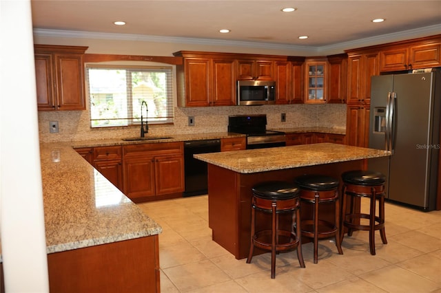 12929 Sugar Creek Blvd, Hudson, FL 34669 - kitchen with appliances with stainless steel finishes, a sink, a breakfast bar, light tile patterned floors, and light stone counters