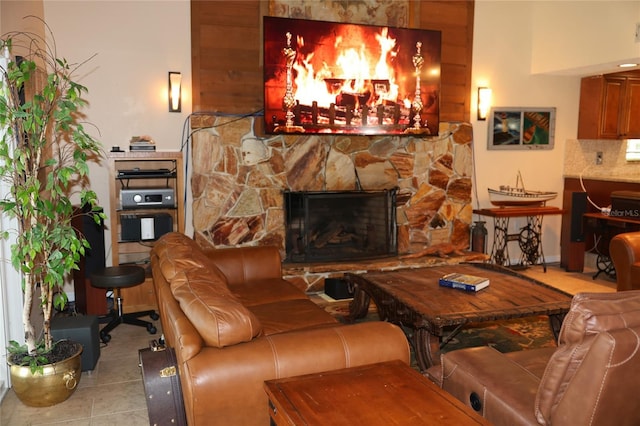 12929 Sugar Creek Blvd, Hudson, FL 34669 - living area featuring tile patterned floors and a stone fireplace