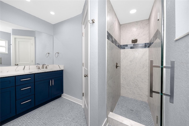 9909 San Mateo Way, Port Richey, FL 34668 - full bathroom featuring walk in shower, double vanity, baseboards, and recessed lighting