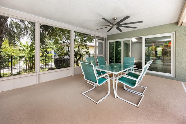 9909 San Mateo Way, Port Richey, FL 34668 - sunroom / solarium featuring a ceiling fan and outdoor dining space