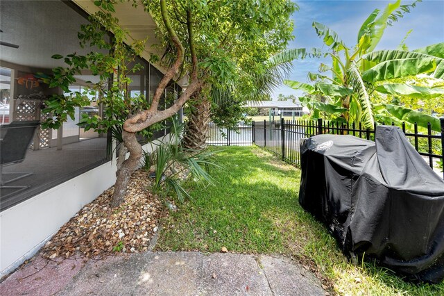 9909 San Mateo Way, Port Richey, FL 34668 - view of yard with a water view