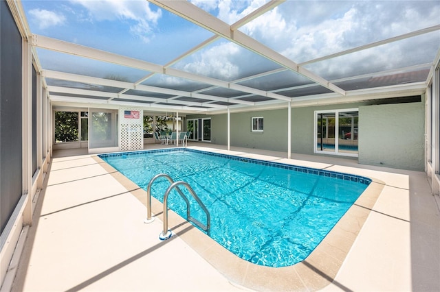 9909 San Mateo Way, Port Richey, FL 34668 - outdoor pool with a patio area and a lanai