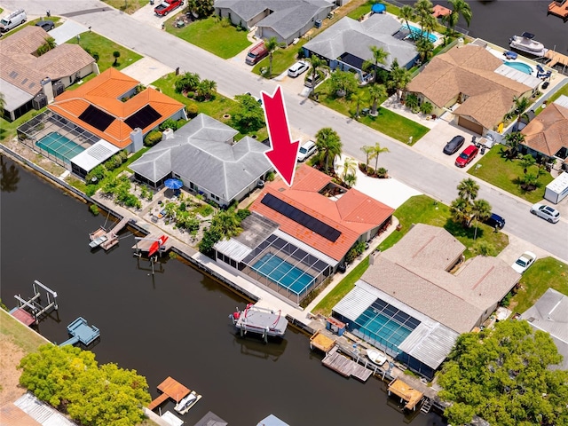 9909 San Mateo Way, Port Richey, FL 34668 - aerial perspective of suburban area with a nearby body of water