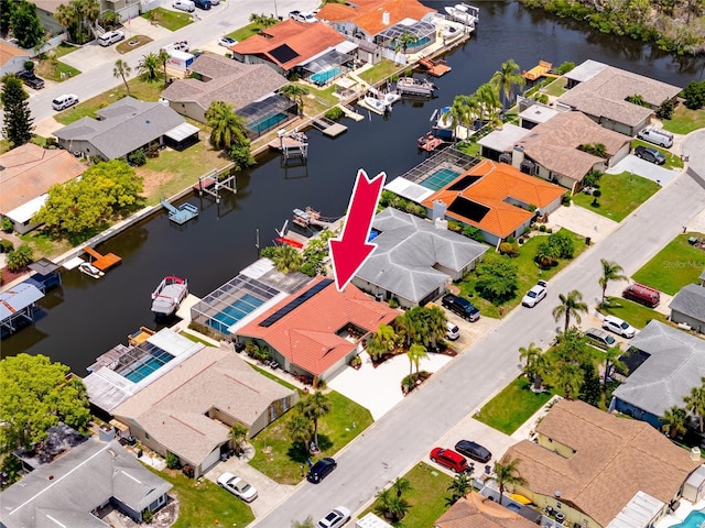 9909 San Mateo Way, Port Richey, FL 34668 - aerial perspective of suburban area featuring a large body of water