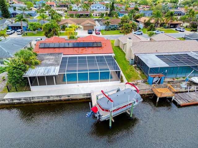 9909 San Mateo Way, Port Richey, FL 34668 - aerial view of residential area featuring a large body of water