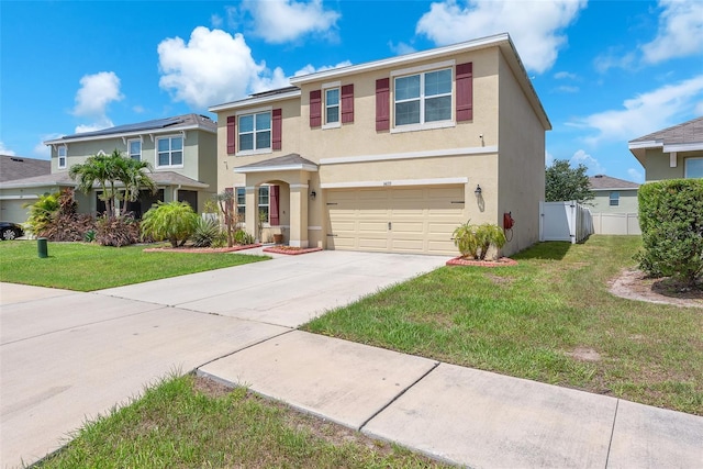 14135 Arbor Pines Dr, Riverview, FL 33579 - view of front of home featuring stucco siding, a garage, and driveway