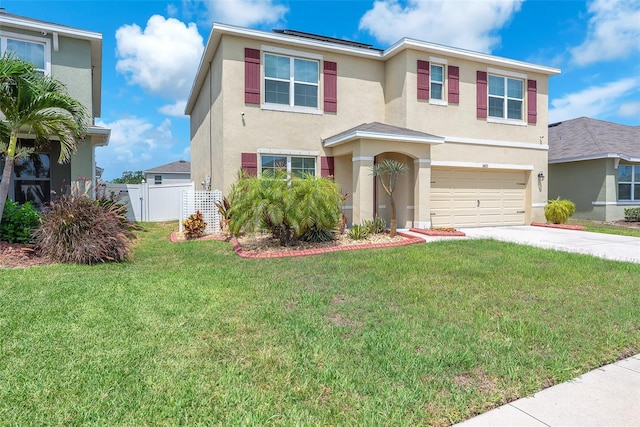 14135 Arbor Pines Dr, Riverview, FL 33579 - traditional home featuring stucco siding, a garage, and driveway