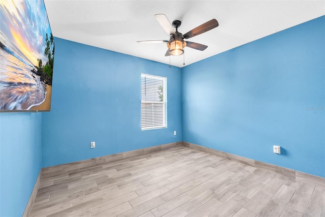 14135 Arbor Pines Dr, Riverview, FL 33579 - spare room with wood finished floors, ceiling fan, and baseboards