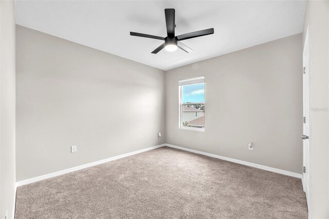 14135 Arbor Pines Dr, Riverview, FL 33579 - empty room featuring carpet and ceiling fan