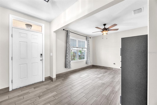 14135 Arbor Pines Dr, Riverview, FL 33579 - entrance foyer with a ceiling fan and wood finished floors