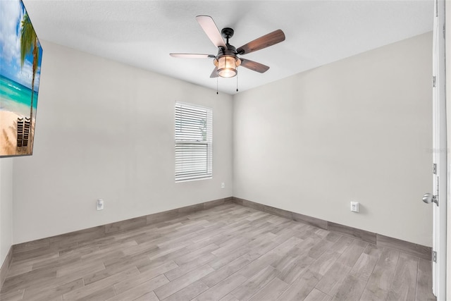 14135 Arbor Pines Dr, Riverview, FL 33579 - empty room with wood finished floors and a ceiling fan