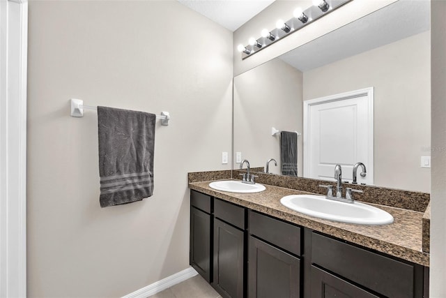 14135 Arbor Pines Dr, Riverview, FL 33579 - bathroom featuring double vanity and tile patterned floors