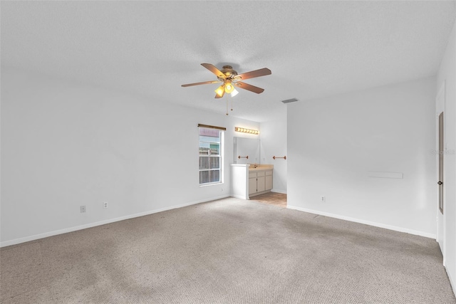 11816 Cedarfield Dr, Riverview, FL 33579 - spare room with ceiling fan, light carpet, baseboards, and a sink
