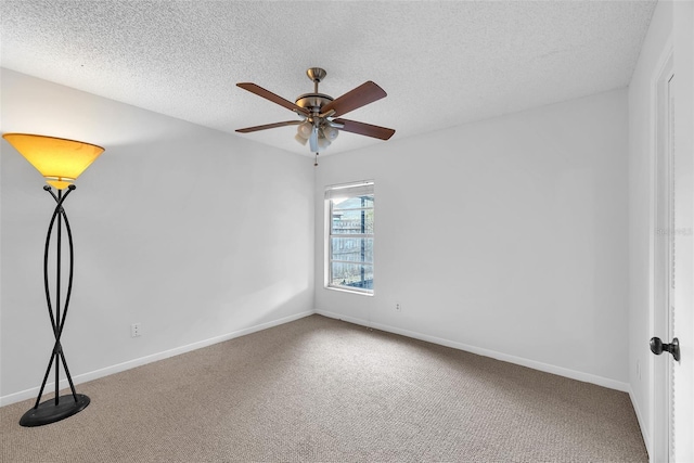 11816 Cedarfield Dr, Riverview, FL 33579 - spare room with carpet floors, ceiling fan, a textured ceiling, and baseboards