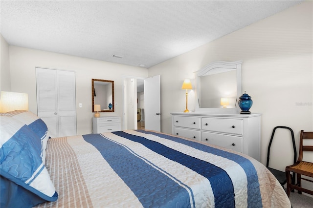 3114 59th St S Unit 203, Gulfport, FL 33707 - carpeted bedroom with a textured ceiling