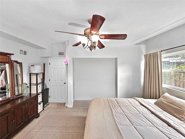 6700 14th St N, Saint Petersburg, FL 33702 - bedroom featuring light colored carpet and ceiling fan