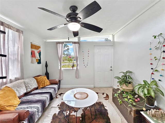 6700 14th St N, Saint Petersburg, FL 33702 - living room with carpet flooring, plenty of natural light, ceiling fan, and baseboards