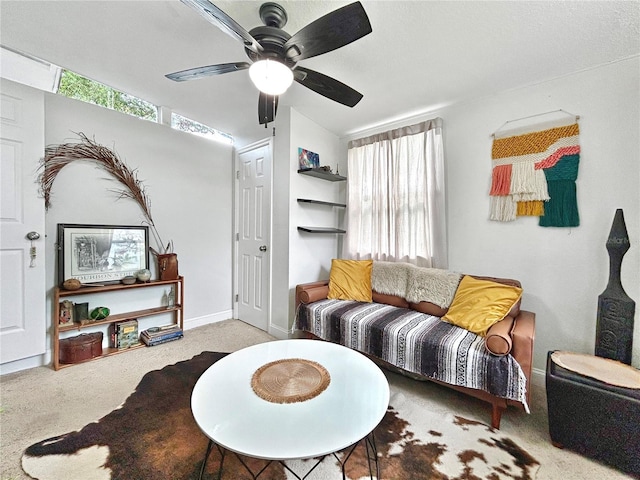 6700 14th St N, Saint Petersburg, FL 33702 - living room featuring ceiling fan, carpet flooring, and baseboards