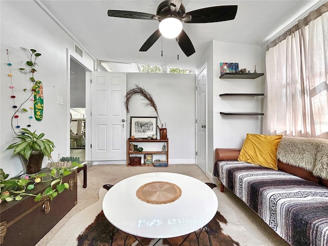 6700 14th St N, Saint Petersburg, FL 33702 - living room featuring carpet, a ceiling fan, plenty of natural light, and baseboards