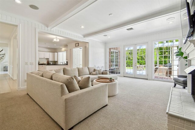 16502 Millan De Avila, Tampa, FL 33613 - living area with light colored carpet and beamed ceiling