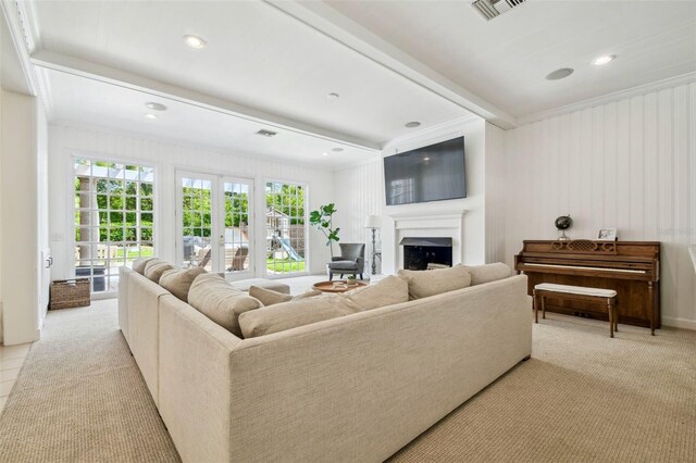 16502 Millan De Avila, Tampa, FL 33613 - living room with a fireplace, ornamental molding, light colored carpet, and recessed lighting