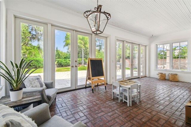 16502 Millan De Avila, Tampa, FL 33613 - sunroom / solarium with french doors and a chandelier